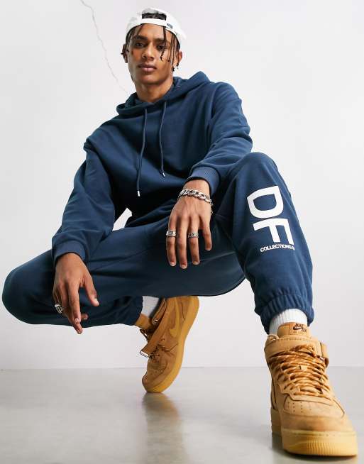 ASOS Dark Future - Joggingbroek van polar fleece in marineblauw met grote logoprint, deel van co-ord set
