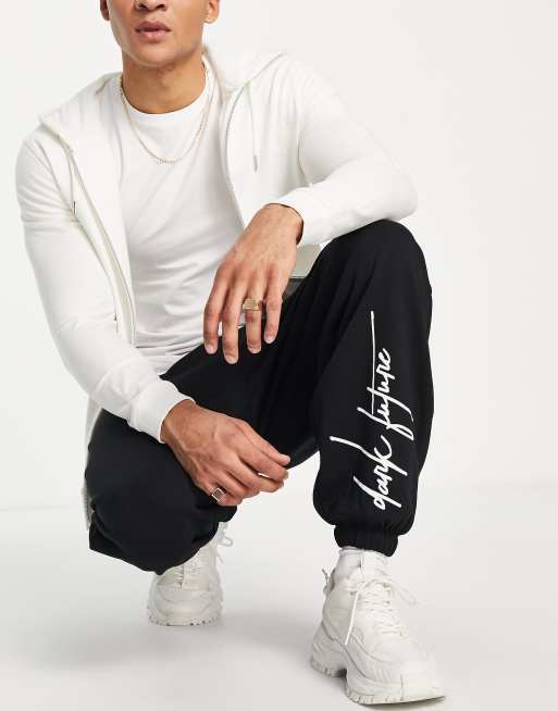 ASOS – Dark Future – Oversize-Jogginghose mit Logoprint in Schwarz, Kombiteil