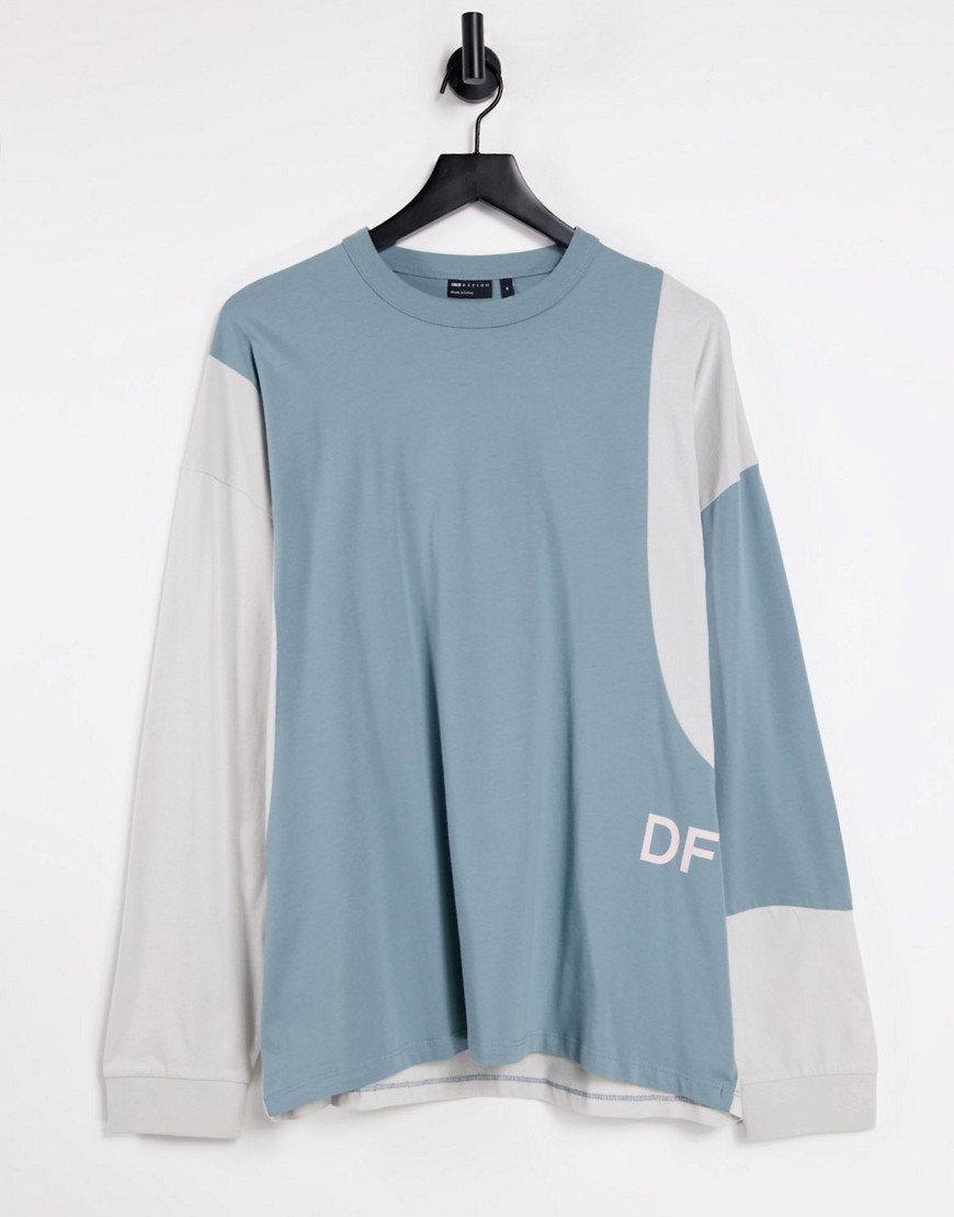 ASOS Dark Future oversized long sleeve t-shirt in blue with curved color block paneling-Blues