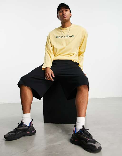 ASOS Dark Future oversized long sleeve t-shirt with large back graphic and  logo print in yellow