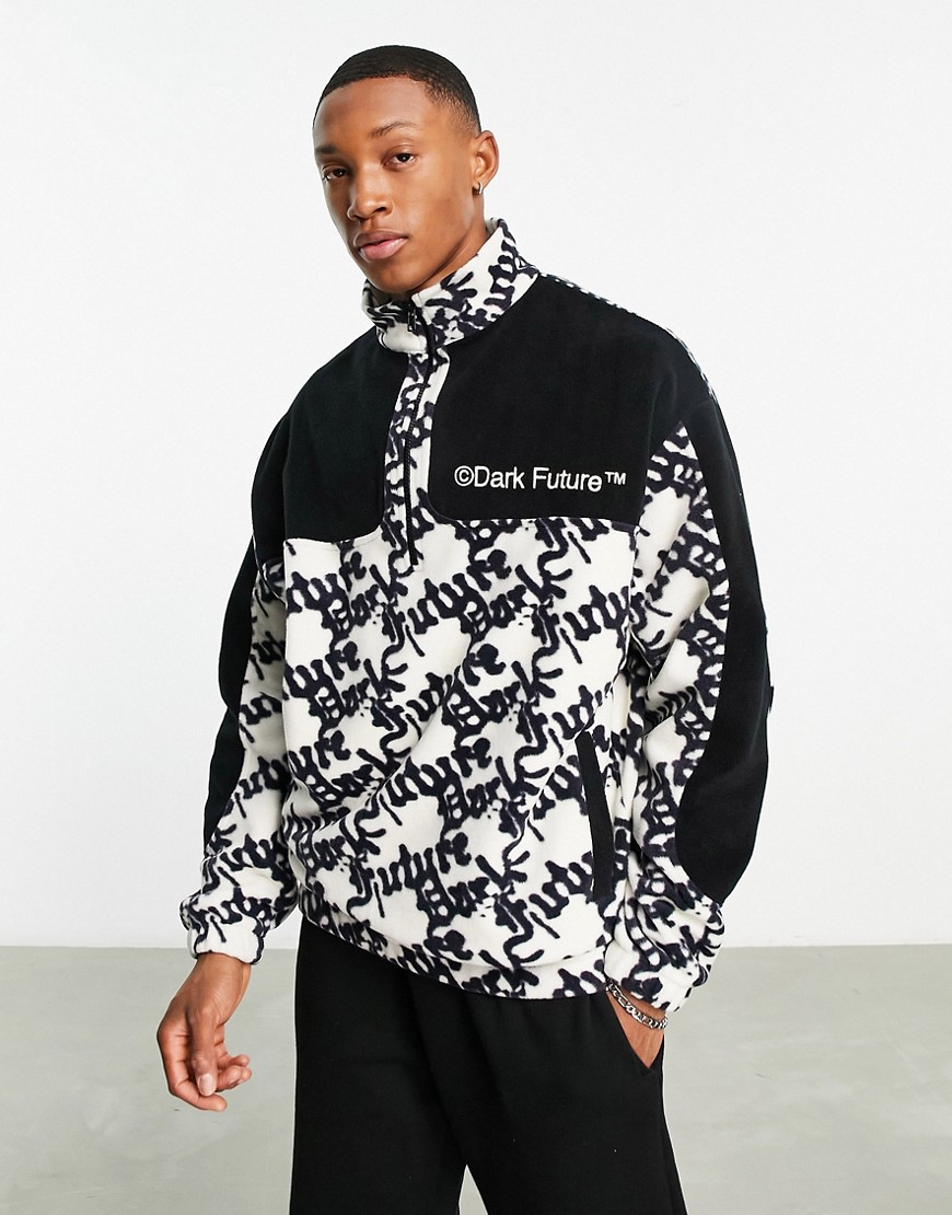ASOS Dark Future oversized quarter zip sweatshirt in polar fleece with all over logo print and paneling in ecru-White