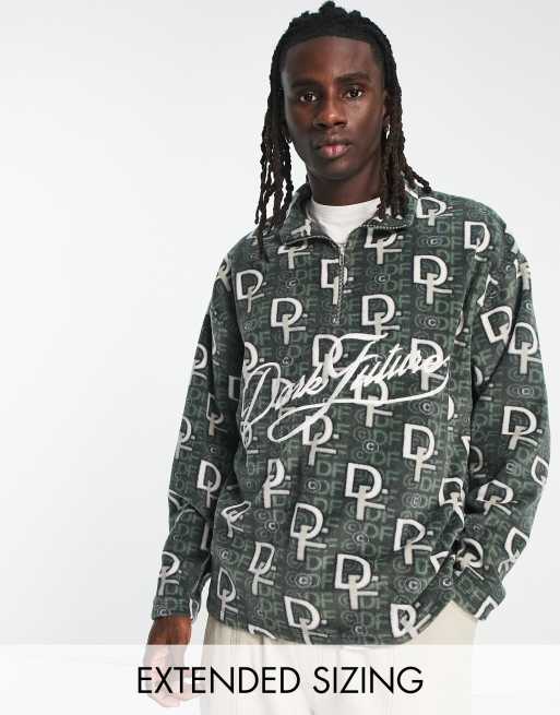 ASOS Dark Future oversized quarter zip sweatshirt in polar fleece with all  over monogram logo print in dark green