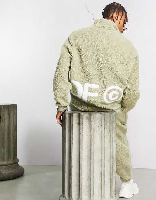 ASOS Dark Future oversized quarter zip sweatshirt in teddy fleece with back logo embroidery in neutral - part of a set