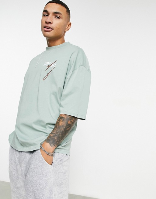 ASOS Dark Future oversized t-shirt in Green with front logo print