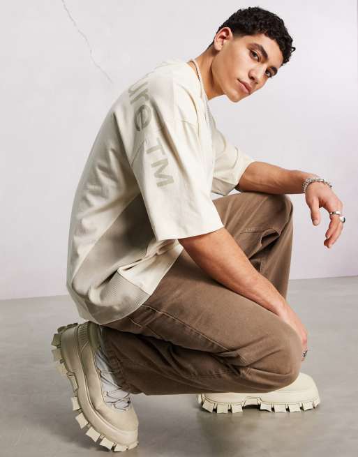 ASOS Dark Future - Oversized T-shirt met 'cut & sew'-panelen en grote logoprint in gebroken wit