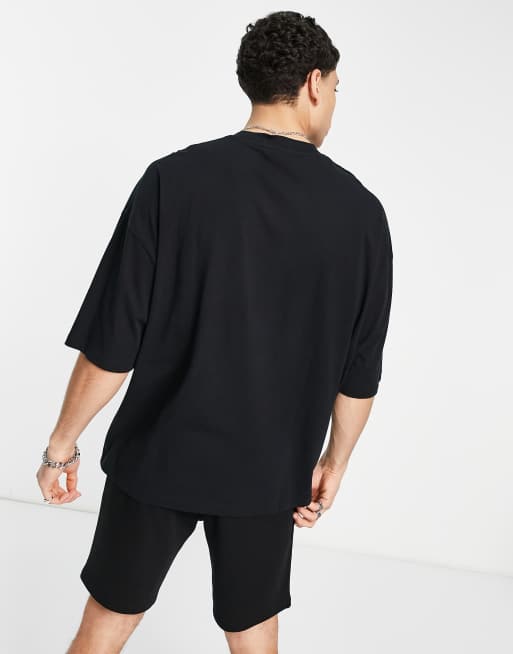 ASOS Dark Future oversized t-shirt with front graphic varsity print in black, 2 of 4