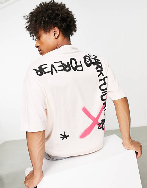 ASOS Dark Future oversized t-shirt with grafitti logo prints in blush ...