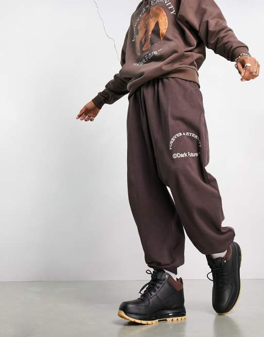 ASOS Dark Future oversized trackies with slogan and logo print in brown (part of a set), 2 of 4