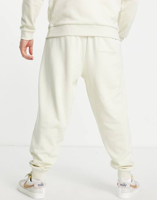 ASOS Dark Future relaxed sweatpants with graffiti logo graphic prints and  fixed hem in white - part of a set