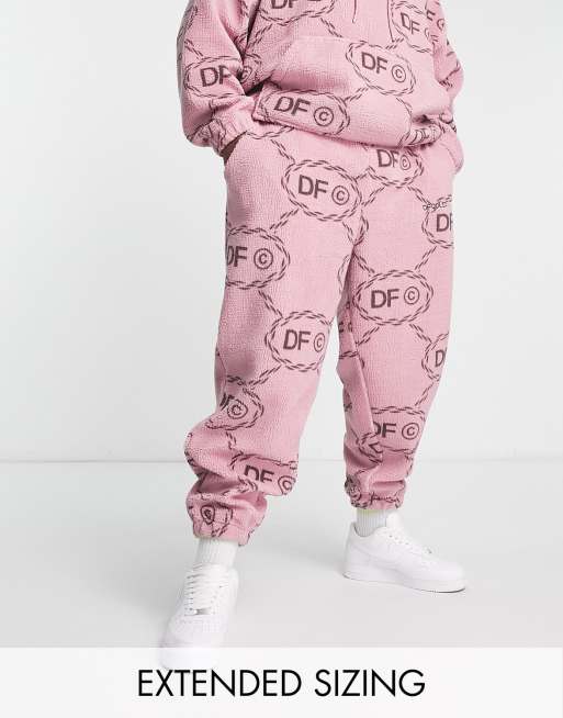 Asos Dark Future Relaxed Trackies In Teddy Borg With All Over Monogram