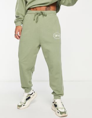 ASOS Dark Future relaxed trackies with piping in khaki green (part of a set)