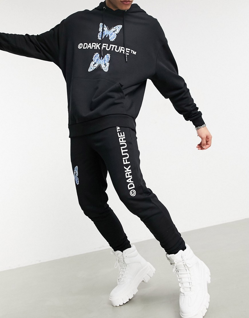 ASOS - Dark Future - Skinny joggingbroek met vlinderlogo in zwart, combi-set