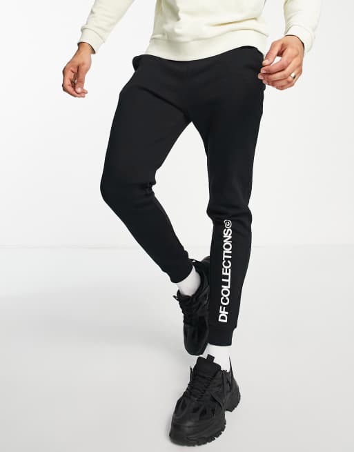 ASOS Dark Future skinny sweatpants in black with logo print - part of a set