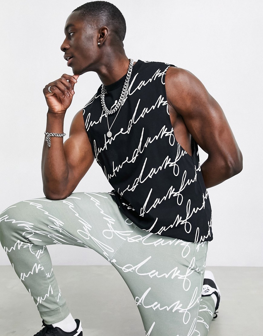 ASOS Dark Future sleevless t-shirt in black with all over signature print