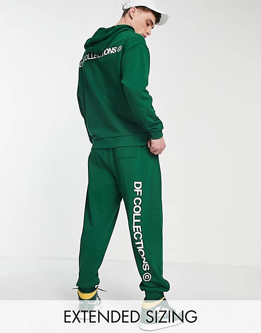 ASOS Dark Future sweatpants with logo prints in dark green - part of a set