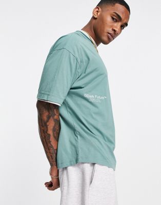 Nouveau Dark Future - T-shirt oversize avec double bord brut et grand logo imprimé au dos - Vert sarcelle