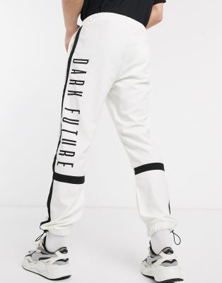 white tapered joggers