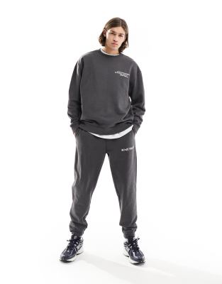 ASOS Dark Future tapered trackies in charcoal grey with print | ASOS