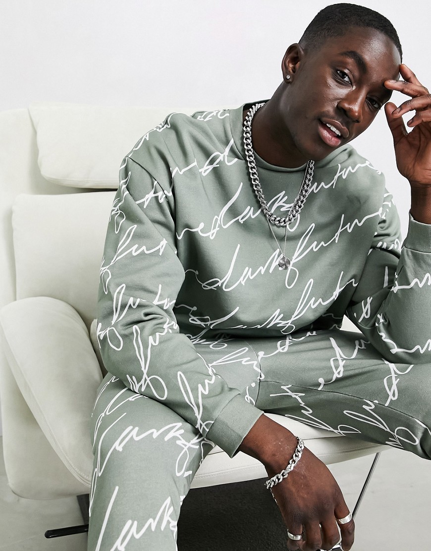 ASOS Dark Future tracksuit in khaki with all over signature print-Gray