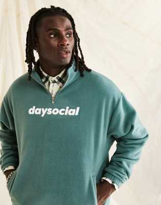 ASOS Day Social quarter zip sweatshirt in polar fleece in logo print in teal blue