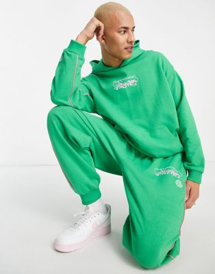 ASOS Daysocial co-ord oversized hoodie with logo graphic prints and contrast piping in green