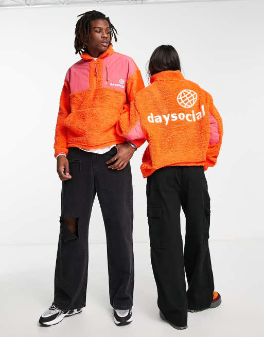 ASOS Daysocial - Felpa oversize unisex in pile borg rossa con logo ricamato e zip corta
