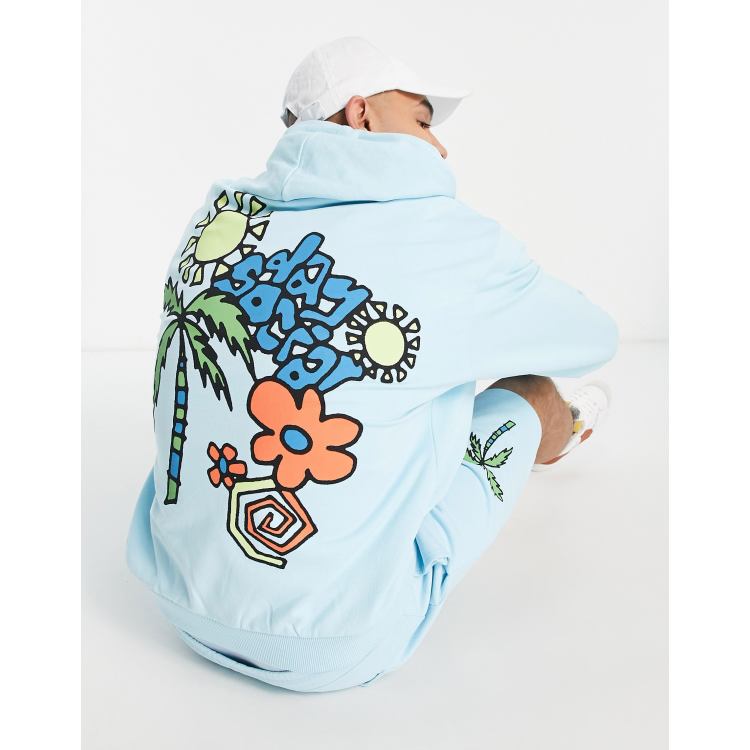 ASOS Daysocial oversized hoodie with large back cartoon graphic print in light blue part of a set