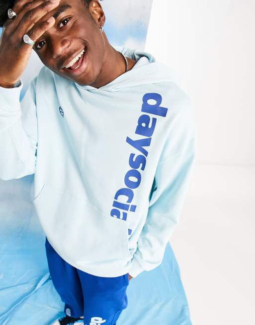 ASOS Daysocial oversized hoodie with vertical logo print in light blue part of a set