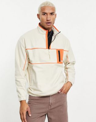 ASOS Daysocial oversized quarter zip polar fleece with orange colour pop details in off white