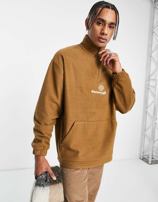 ASOS Daysocial oversized quarter zip sweatshirt in polar fleece with logo  print in brown