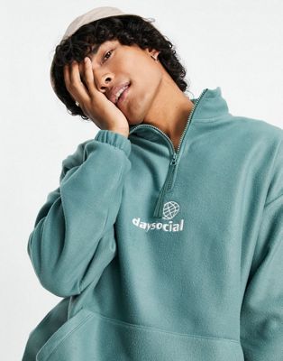 ASOS Daysocial oversized quarter zip sweatshirt in polar fleece with logo print in teal