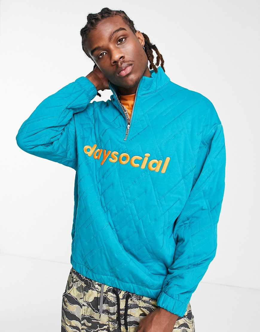 ASOS Daysocial oversized quarter zip sweatshirt with geo quilting and logo embroidery in teal green