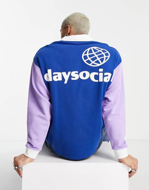 ASOS Daysocial - Oversized rugbyshirt met gekleurde mouwen in marineblauw