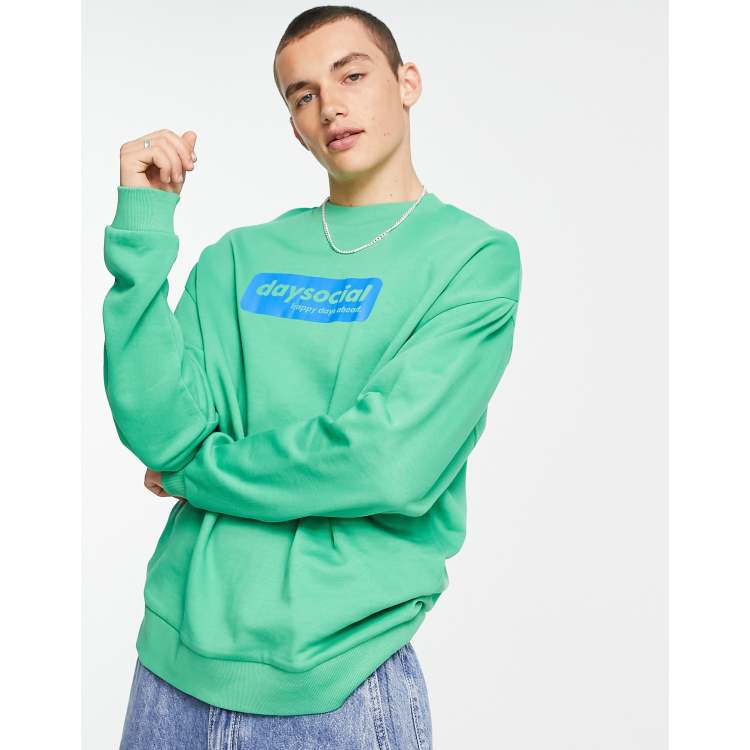 ASOS Daysocial oversized sweatshirt with blue badge logo print in green |  ASOS