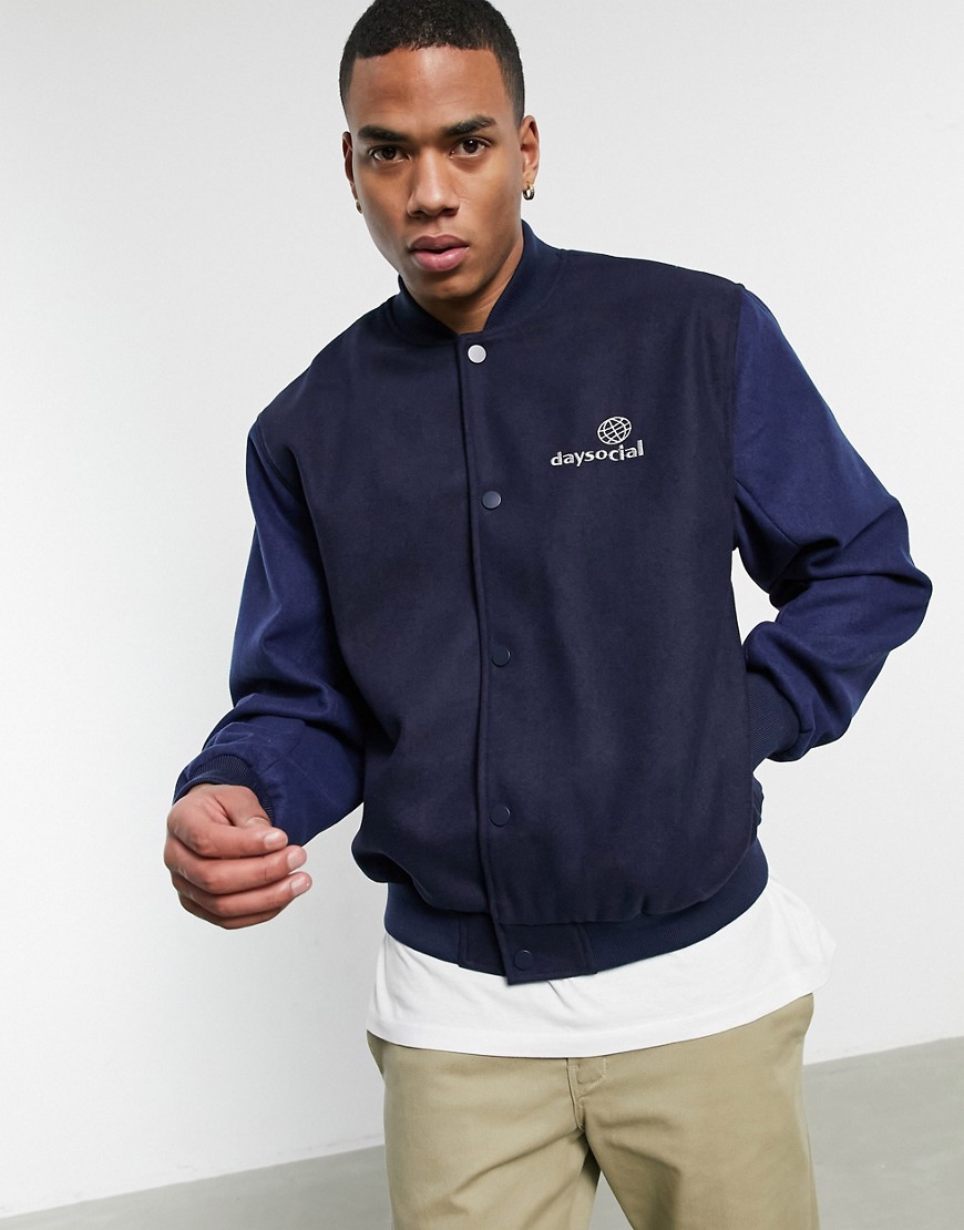 ASOS Daysocial oversized varsity jacket in navy with contrast blue sleeves