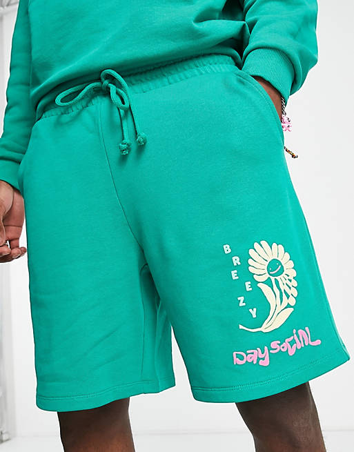 Pantaloncini comodi verdi unisex con stampa "Breezy" in coordinato Asos Abbigliamento Pantaloni e jeans Shorts Pantaloncini ASOS Daysocial 