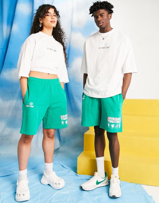 Pantaloncini unisex comodi verdi con stampa grafica e logo in coordinato Asos Abbigliamento Pantaloni e jeans Shorts Pantaloncini ASOS Daysocial 