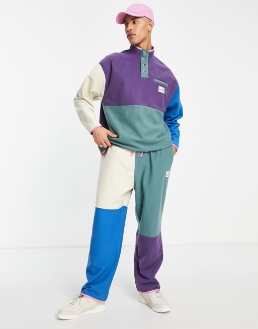ASOS Daysocial relaxed sweatpants in color block polar fleece with logo patch - part of a set 