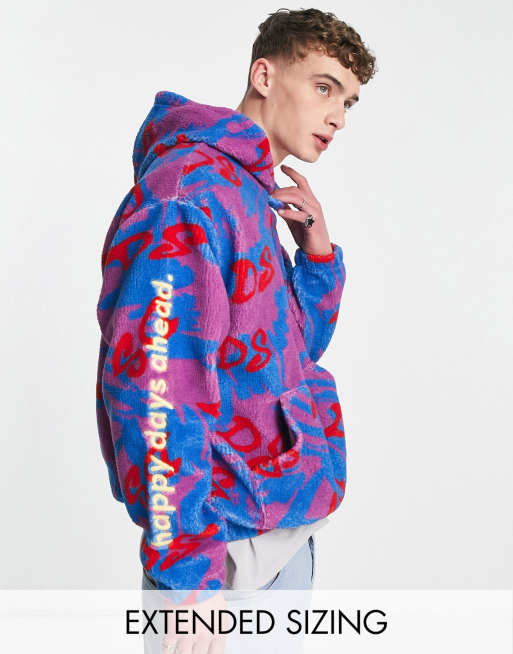ASOS Daysocial - Sweat à capuche oversize en imitation peau de mouton imprimée sur l'ensemble avec logos brodés - Bleu