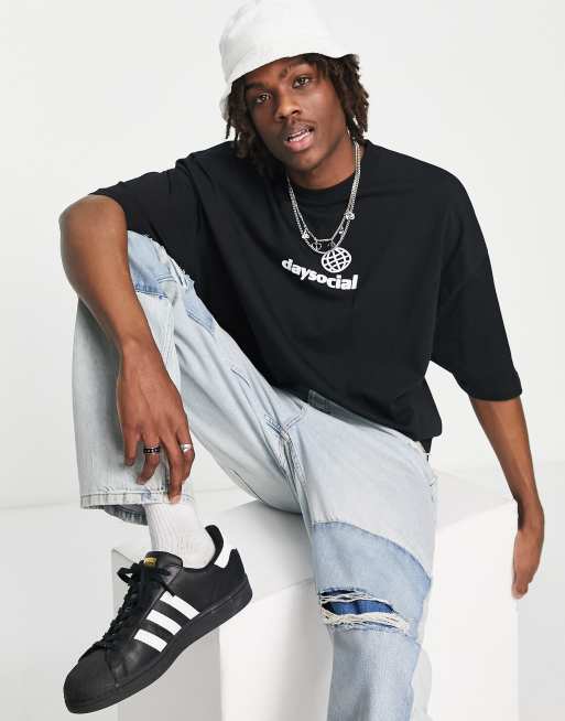 ASOS - Daysocial - T-shirt oversize à imprimé sur la poitrine - Noir
