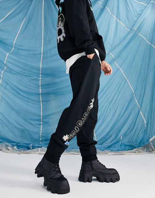 ASOS DESIGN combat jogger with pockets and chain detail