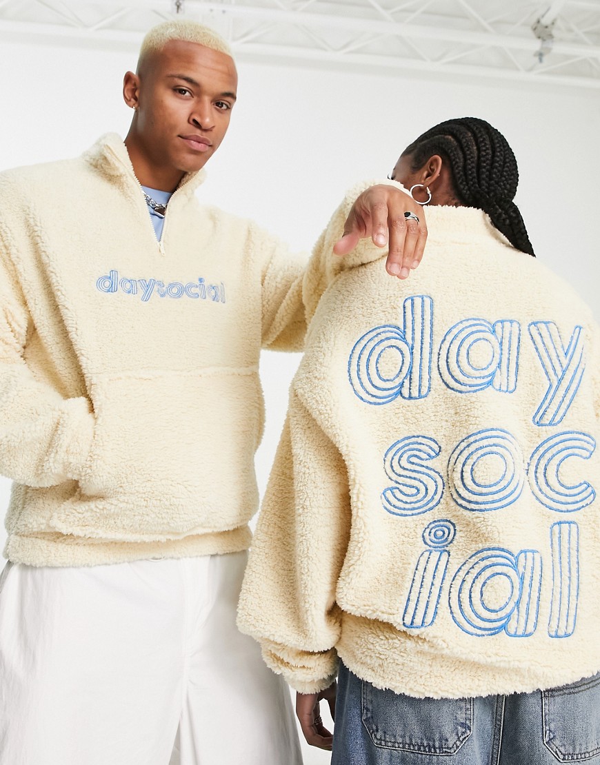 ASOS Daysocial unisex oversized quarter zip sweatshirt in teddy borg with logo embroideries in ecru-White