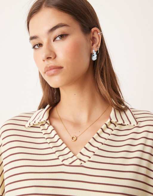 ASOS DEIGN long sleeve collared rugby shirt in yellow stripes