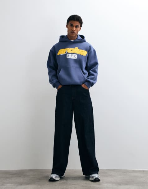 ASOS DEISGN oversized hoodie with chest applique in navy - view 1