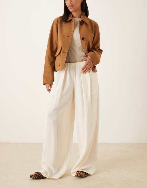 ASOS DEISGN tailored low rise pull on trousers in cream 