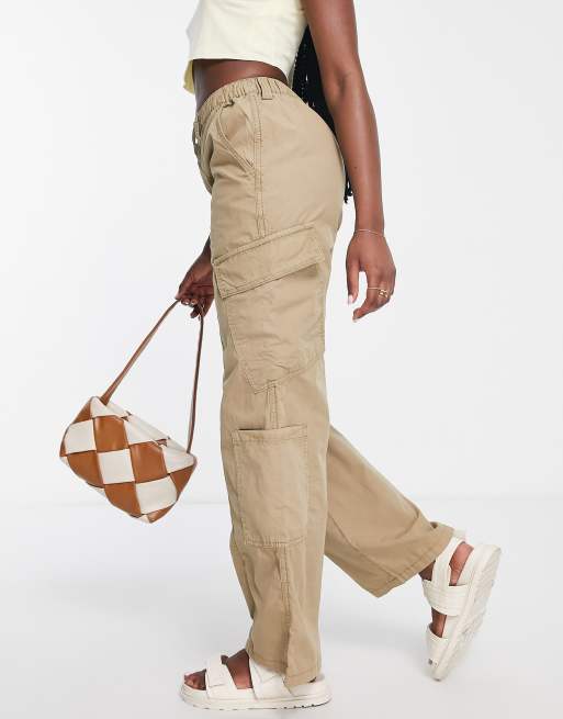 ASOS DESIGN ultra flare cargo pants in khaki sulphur wash