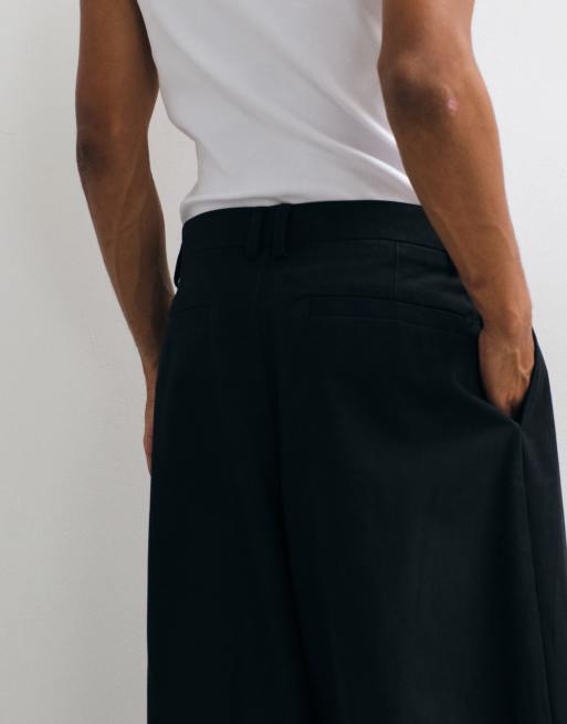 ASOS DESIGN 100% cotton heavyweight tailored extreme barrel trousers in black, 4 of 5