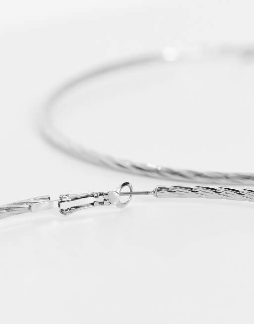ASOS DESIGN 100mm hoop earrings with multi twist design in silver tone, 3 of 4