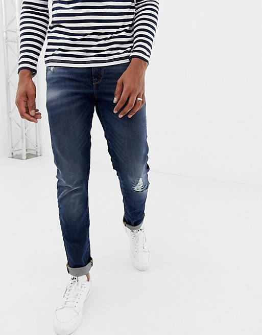 ASOS DESIGN 12.5oz slim jeans in dark wash with abrasions