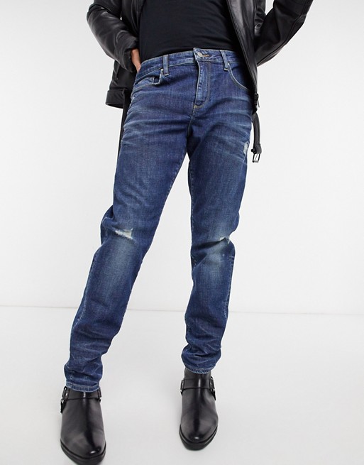 ASOS DESIGN 12.5oz stretch slim jeans in dark blue tint with abrasions